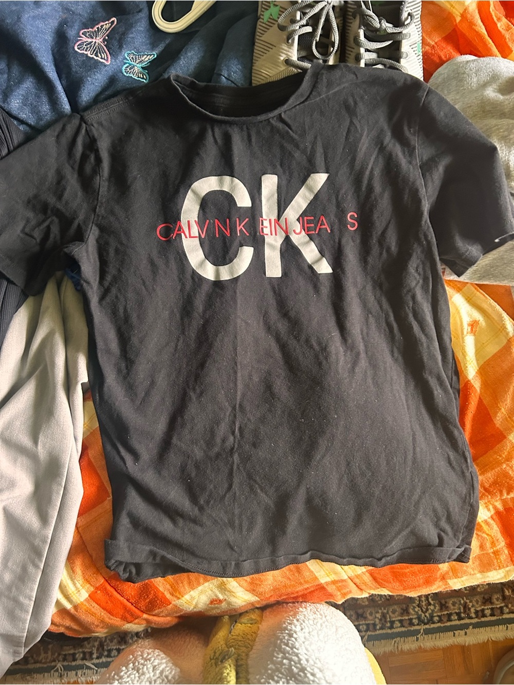 Calvin Klein Jeans Black Tee with White CK and Red Logo